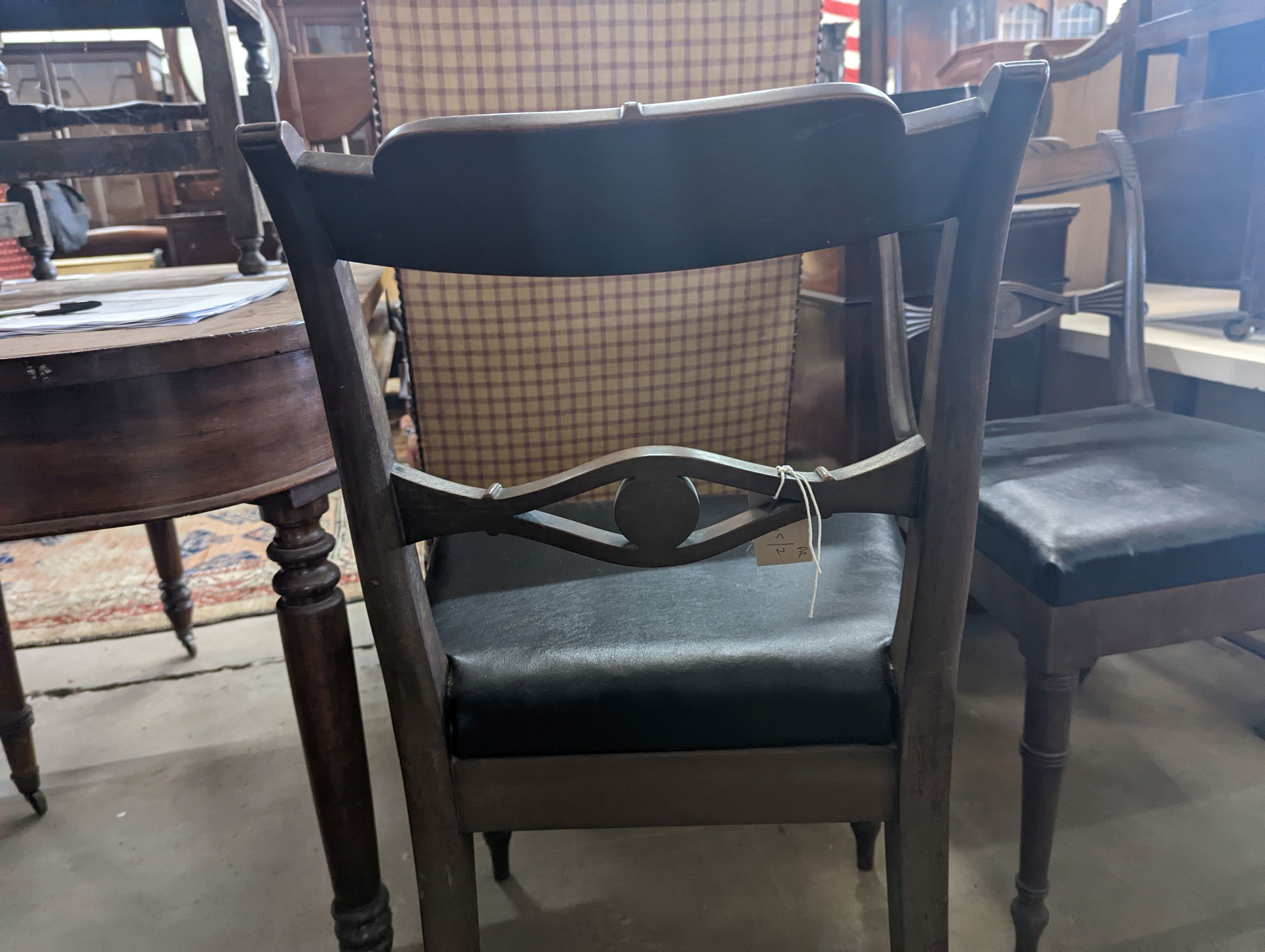 A pair of Regency mahogany dining chairs